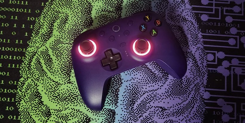 8BitDo Ultimate 2 wireless controller with pink lights around joysticks