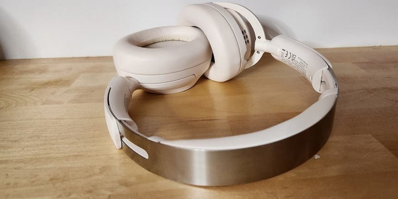 White OneOdio Focus A6 Headphones showing the silver headband