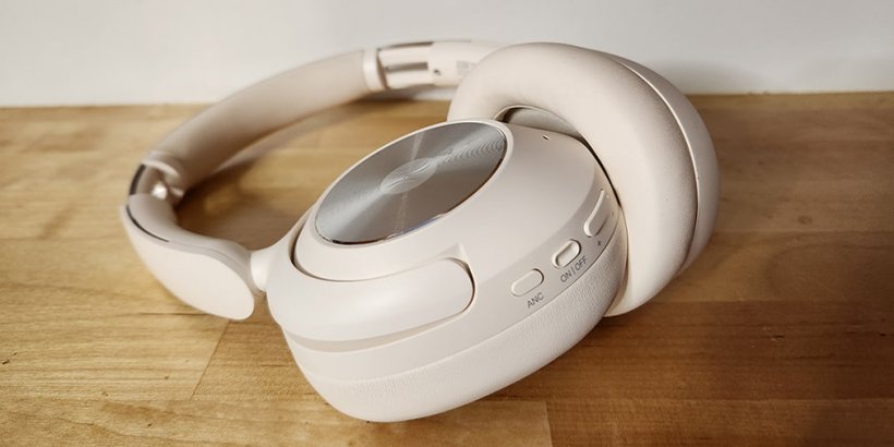 White OneOdio Focus A6 headphones with buttons on ear covering displayed