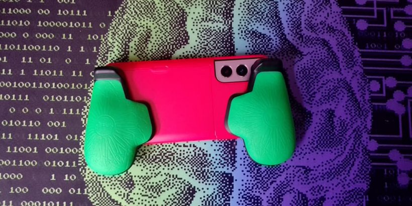 Puk Grips attached to phone in pink case