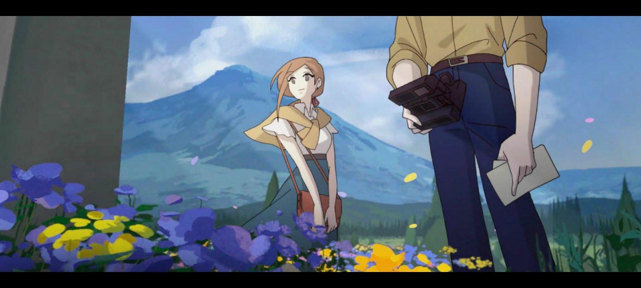 a boy and a girl standing in the middle of a field