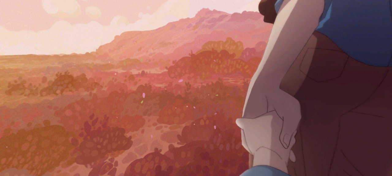 a little boy holding his mother's hand